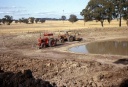 Mud scooping house dam, Upotipotpon. 1970's
