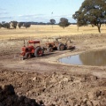 Mud scooping house dam, Upotipotpon. 1970's